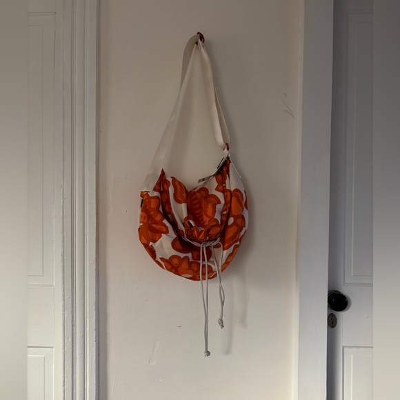Marimekko Orange and White Floral drawstring bag - Uniqlo - Picture 2 of 7